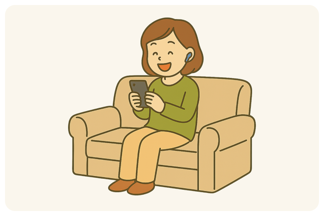 一個人坐在沙發上用手機跟別人聊天的圖示